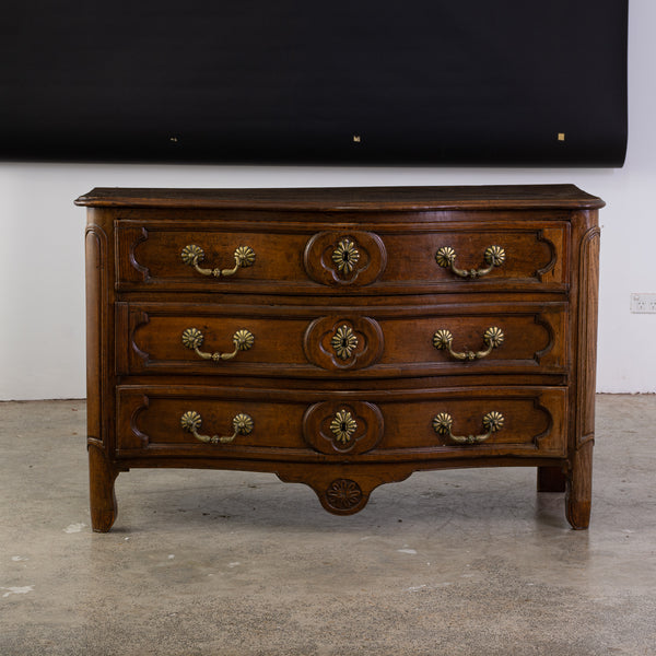 A Louis XV Provinical Walnut Commode