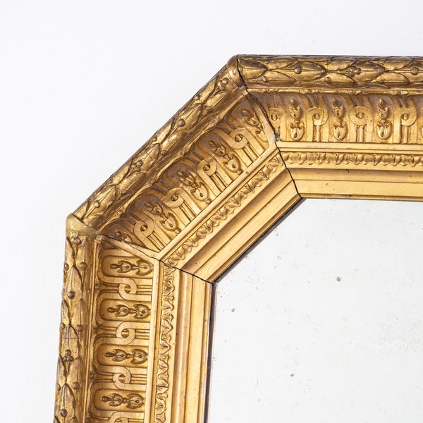 An Octagonal Giltwood Empire Mirror