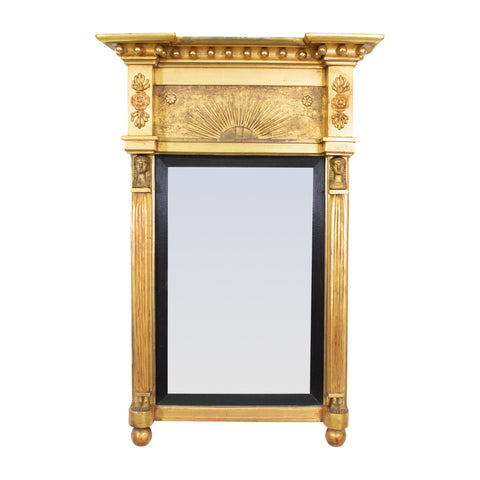 A Late 19th century Giltwood Egyptian Revival Mirror