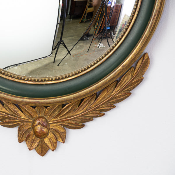 An Empire Style Giltwood and Green Lacquer Convex Mirror