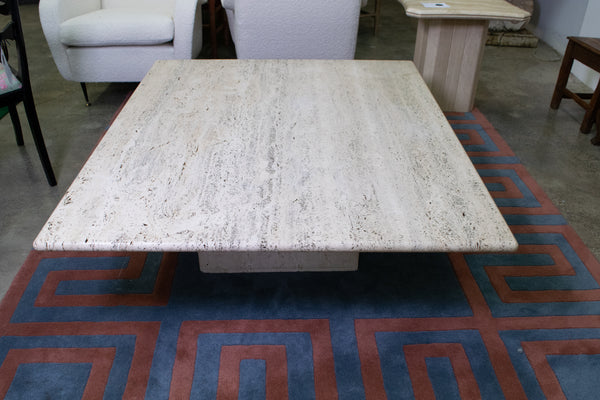 A large Travertine Coffee Table. Cube Base